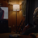 Looking Glass watching American Hero Story.